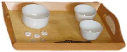 TRANSFERING AND SORTING BUTTONS USING TWEEZERS( FEW BUTTONS,THREE WOODEN BOWLS,WOODEN TRAY WITH A PAIR OF TWEEZERS)